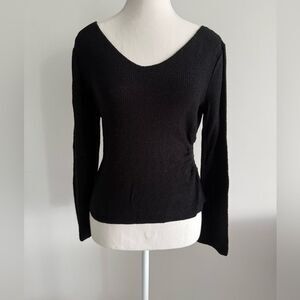 Brenda Serper black knit sweater in size S with peekaboo side preowned